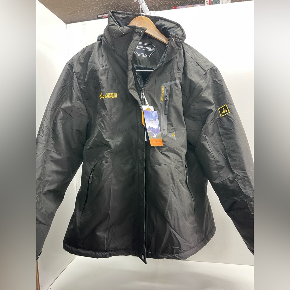 Black Women's Ski Jacket with Yellow Accents by Explorer Outdoor